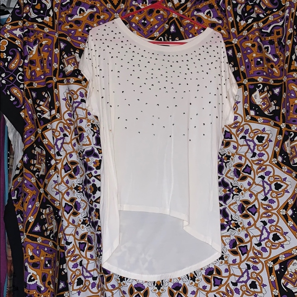 White asymmetrical short sleeve shirt.